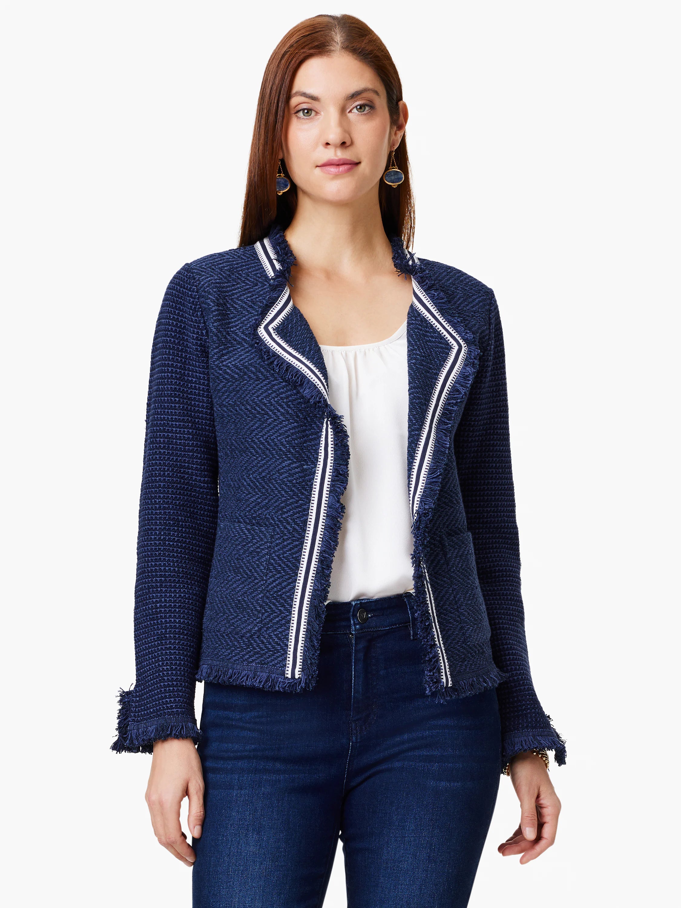 Navy blue knit jacket with white and navy trim and fringe detailing.  Herringbone pattern.