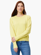 Light yellow crew neck sweater with subtle puff sleeves, ribbed cuffs & hem.