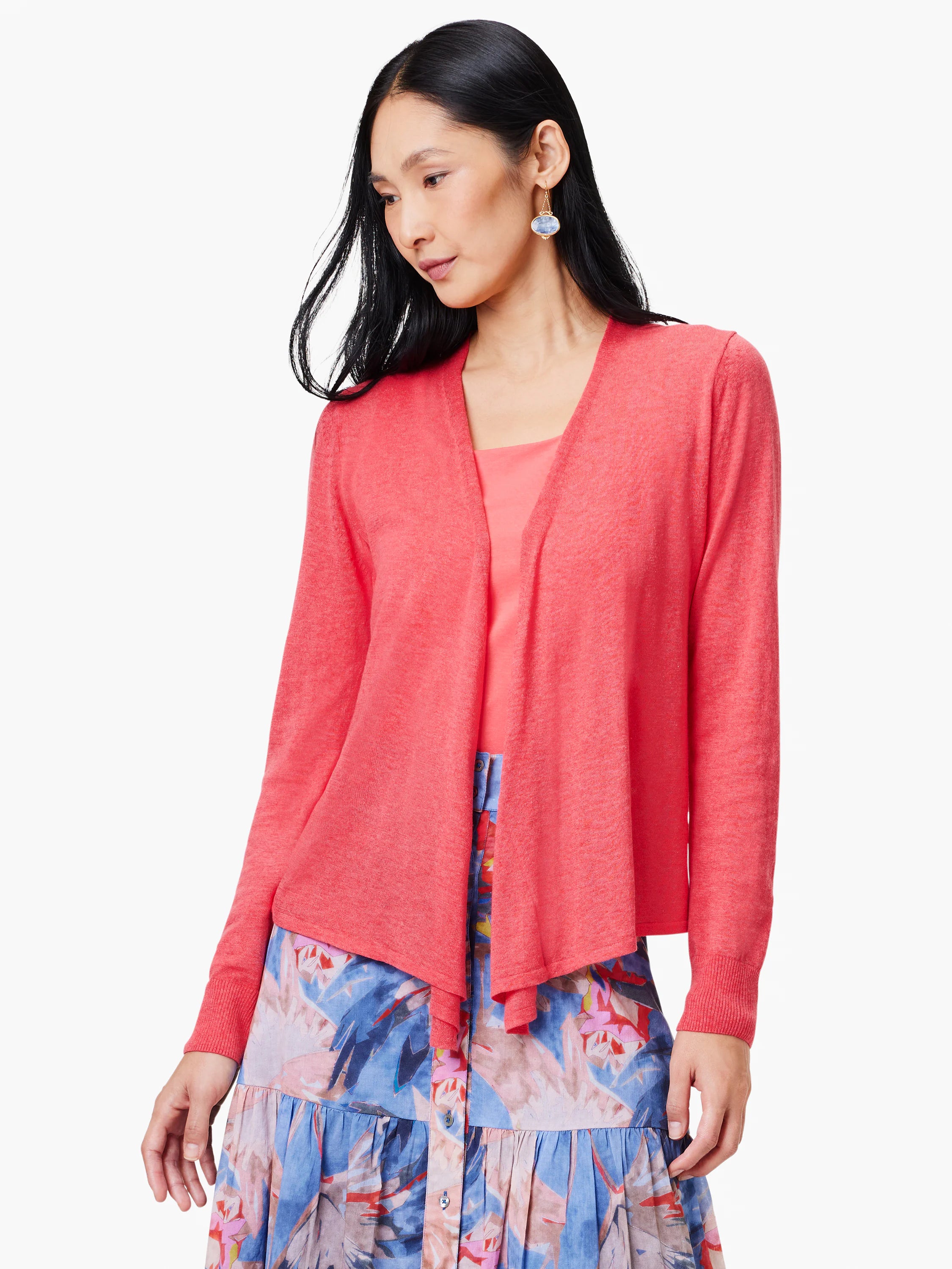 Coral open-front cardigan with long sleeves and a draped, asymmetrical front.