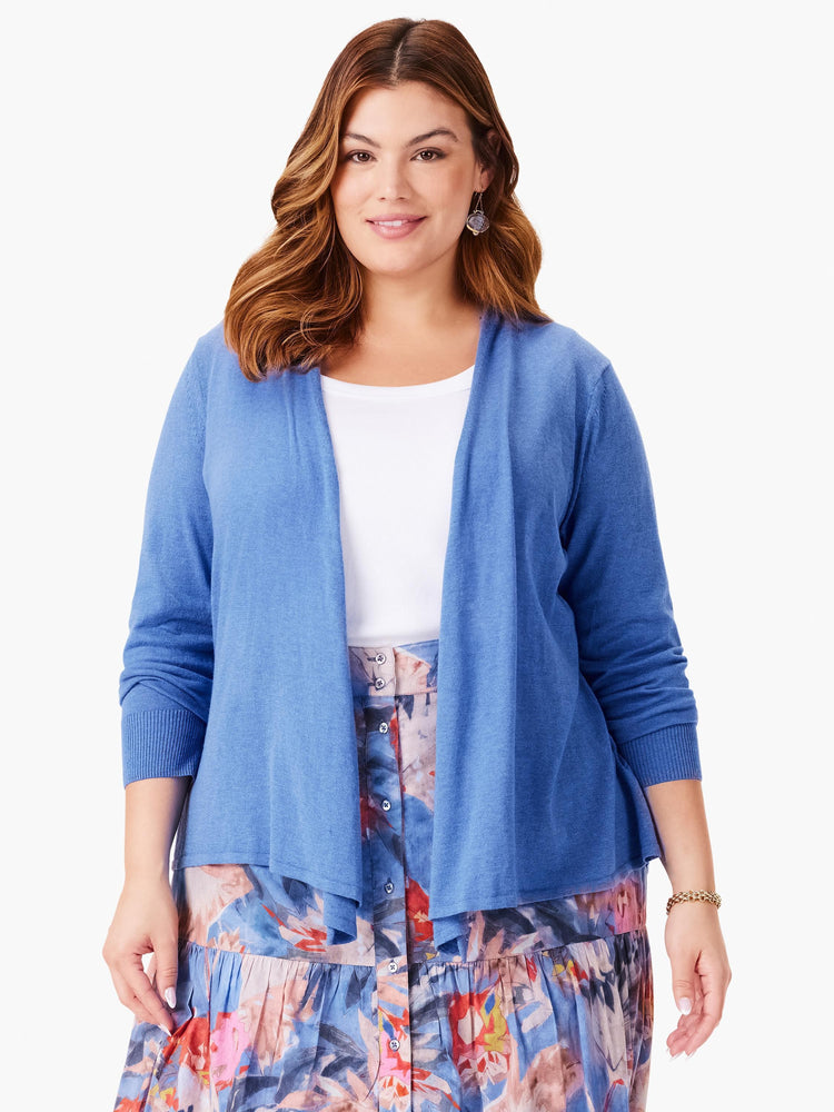 Cornflower blue open-front cardigan with 3/4 sleeves and ribbed cuffs, worn by a woman.