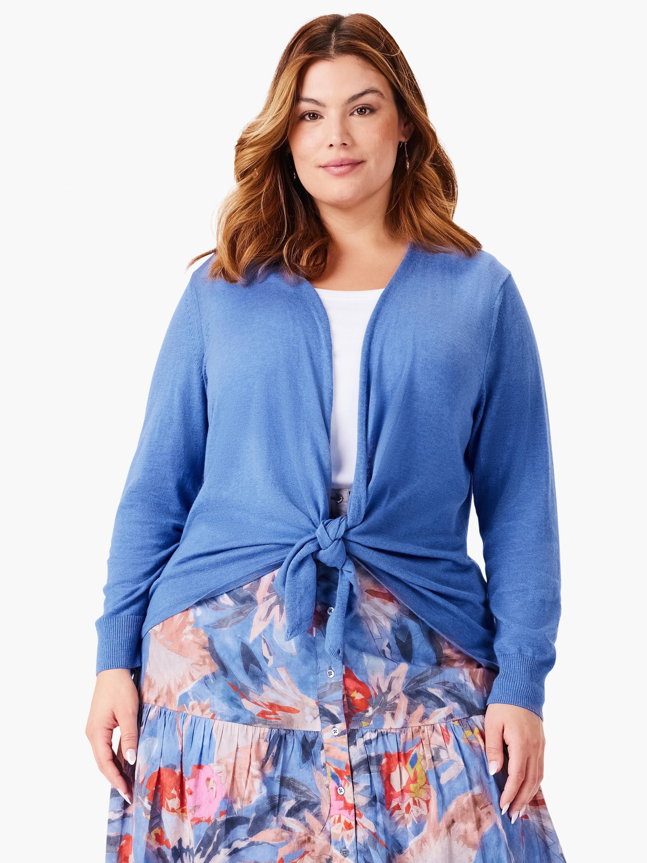 Cornflower blue long sleeve cardigan, styled open and tied in a knot at the waist.