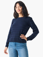 Dark navy blue cashmere sweater with subtle horizontal stripes and gold buttons on the shoulders. Long sleeves, crew neck.