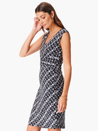 Black & white patterned sleeveless dress.  V-neck, fitted silhouette, knee-length. Shibori-style print.