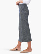 Navy and white fine striped wide-leg cropped jeans with side pockets.