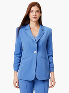 Here's alt text for the image, under 125 characters:

"Solid blue blazer with scrunch sleeves, single button closure, and...