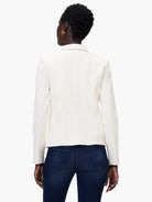 Off-white denim blazer, long sleeves, shown from the back.