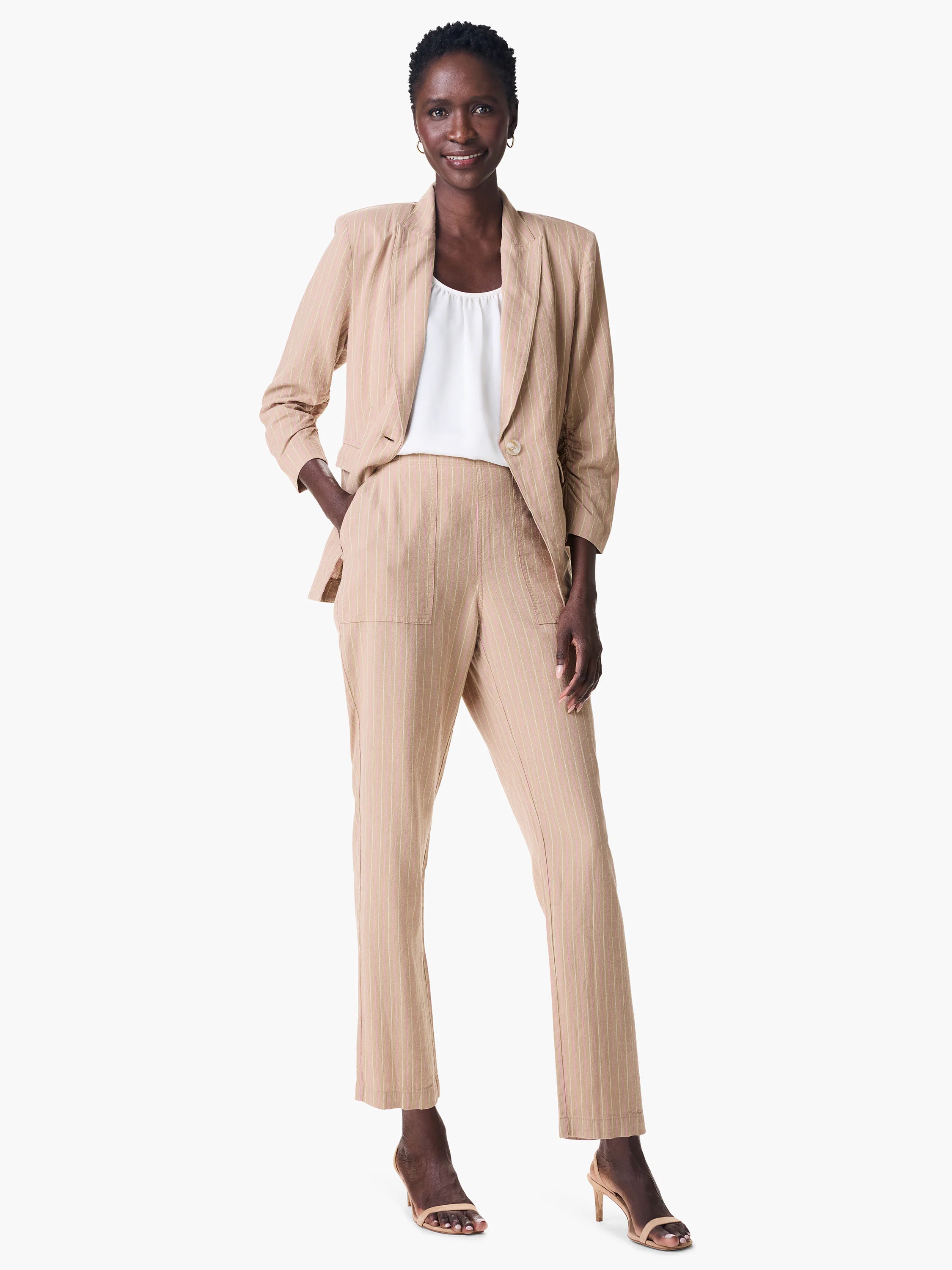 Beige pinstripe jacket and pants.  Three-quarter sleeves, single button.