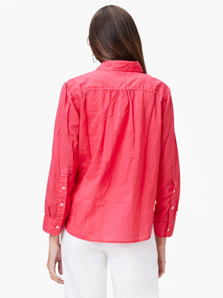 Back view: Coral, relaxed-fit cotton shirt with crinkled texture, pleated back yoke, and white buttons on sleeves.
