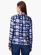 Blue, lavender, and peach abstract print long-sleeve shirt; collared, buttoned.