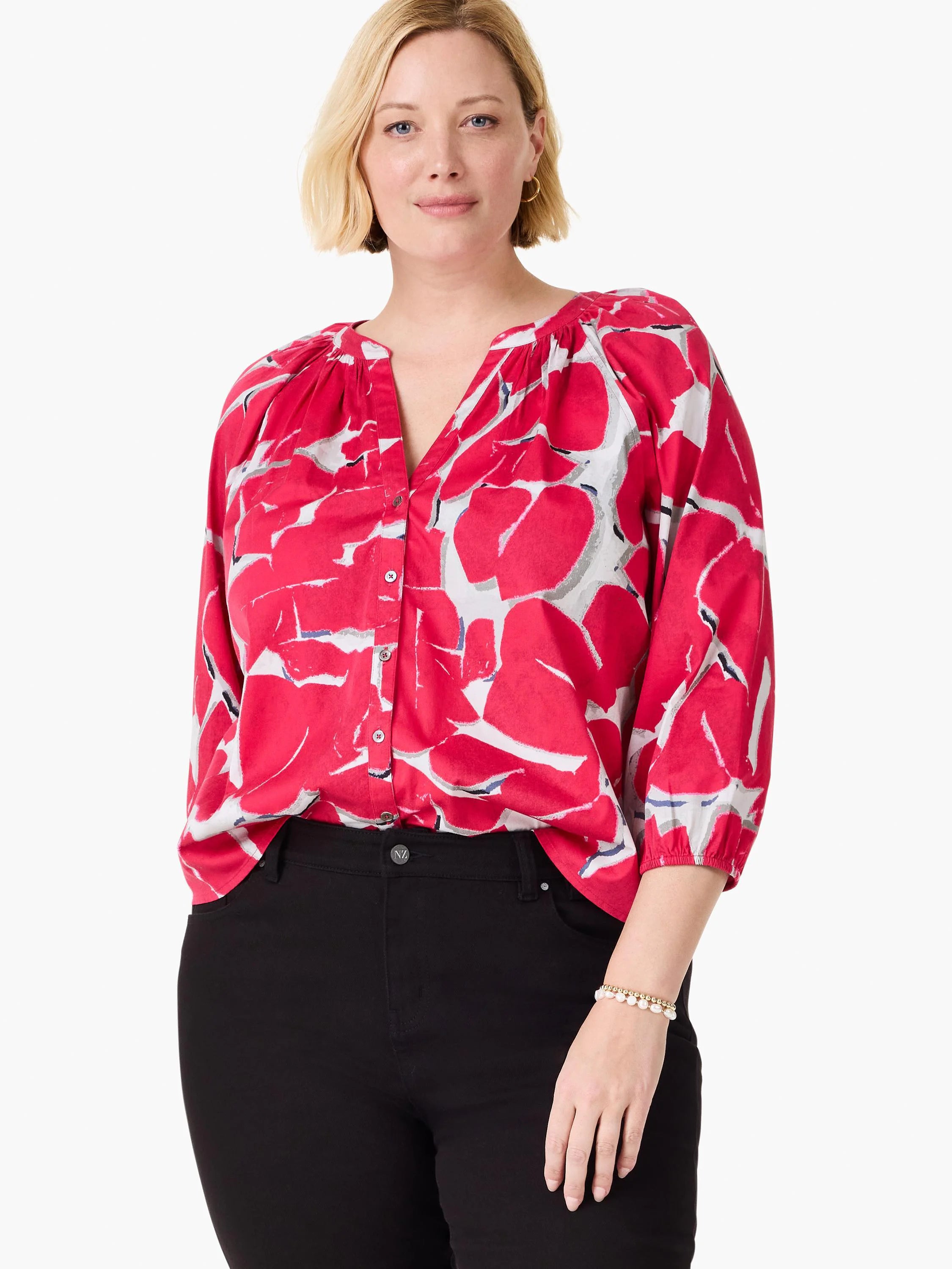 Pink button-front shirt with gray and white abstract print. Three-quarter sleeves.