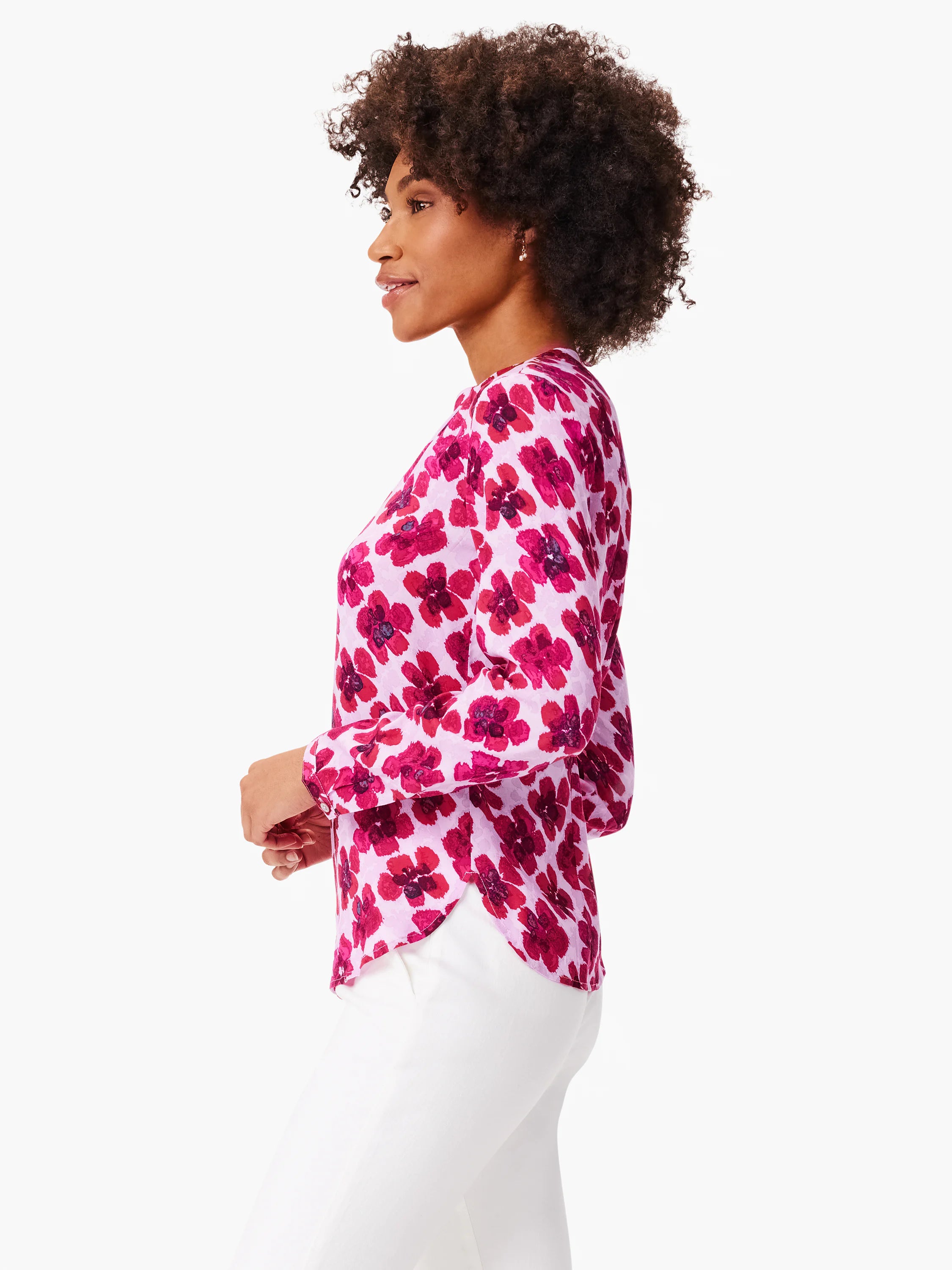 Pink long-sleeve top with a red floral pattern.  The flowers are a dark, reddish-pink.