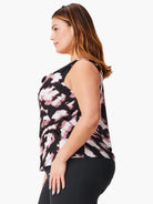 Sleeveless tank top; mauve, black, and white abstract print.  Scoop neck.