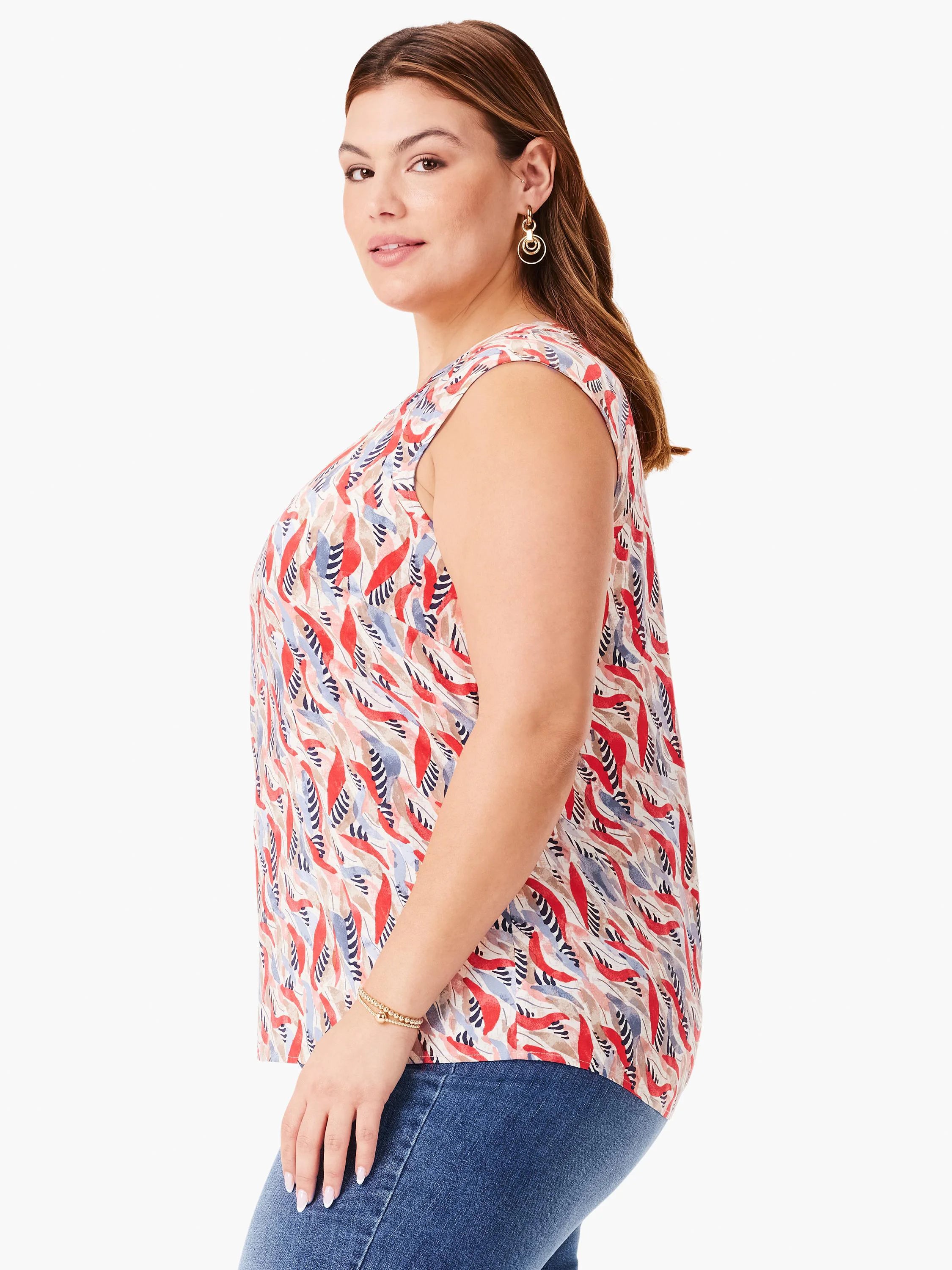 Sleeveless top, off-white background with red, blue, and gray abstract leaf print. Cap sleeves.