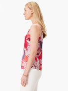 Red, pink, and purple abstract floral print sleeveless crepe cami.  Side profile view.
