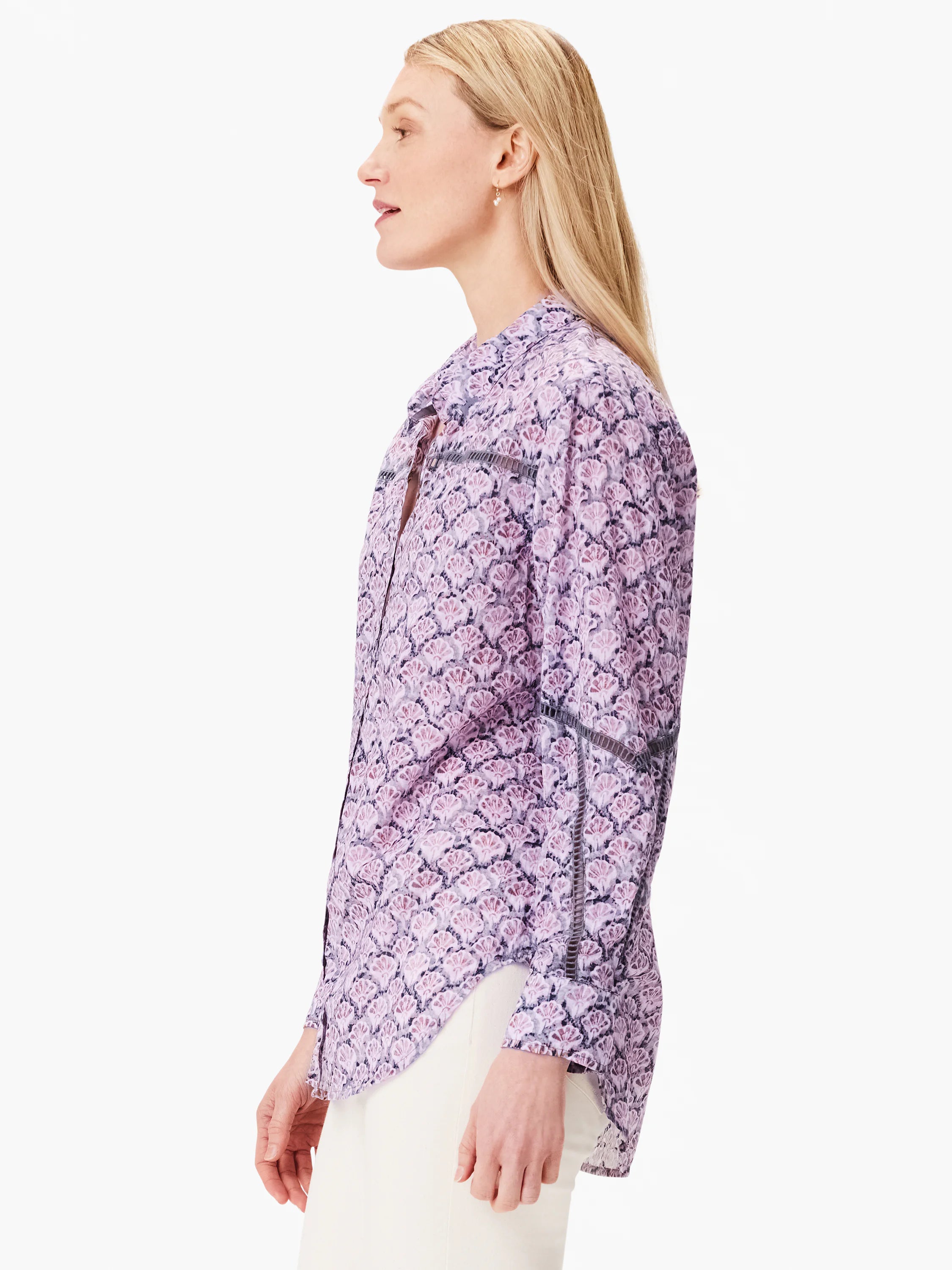 Lavender shirt with a dark purple floral print and white detailing on the placket and cuffs.  Long sleeves.
