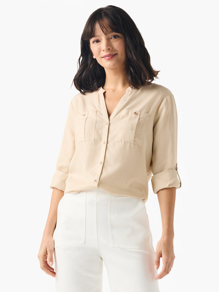 Beige, long-sleeve button-down shirt;  two chest pockets; rolled cuffs.