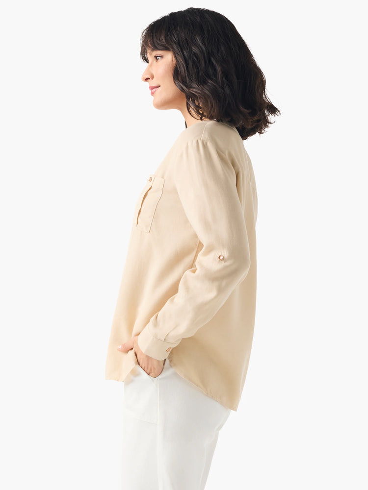 Beige long-sleeve shirt;  chest pocket, rose gold buttons.  Loose fit.