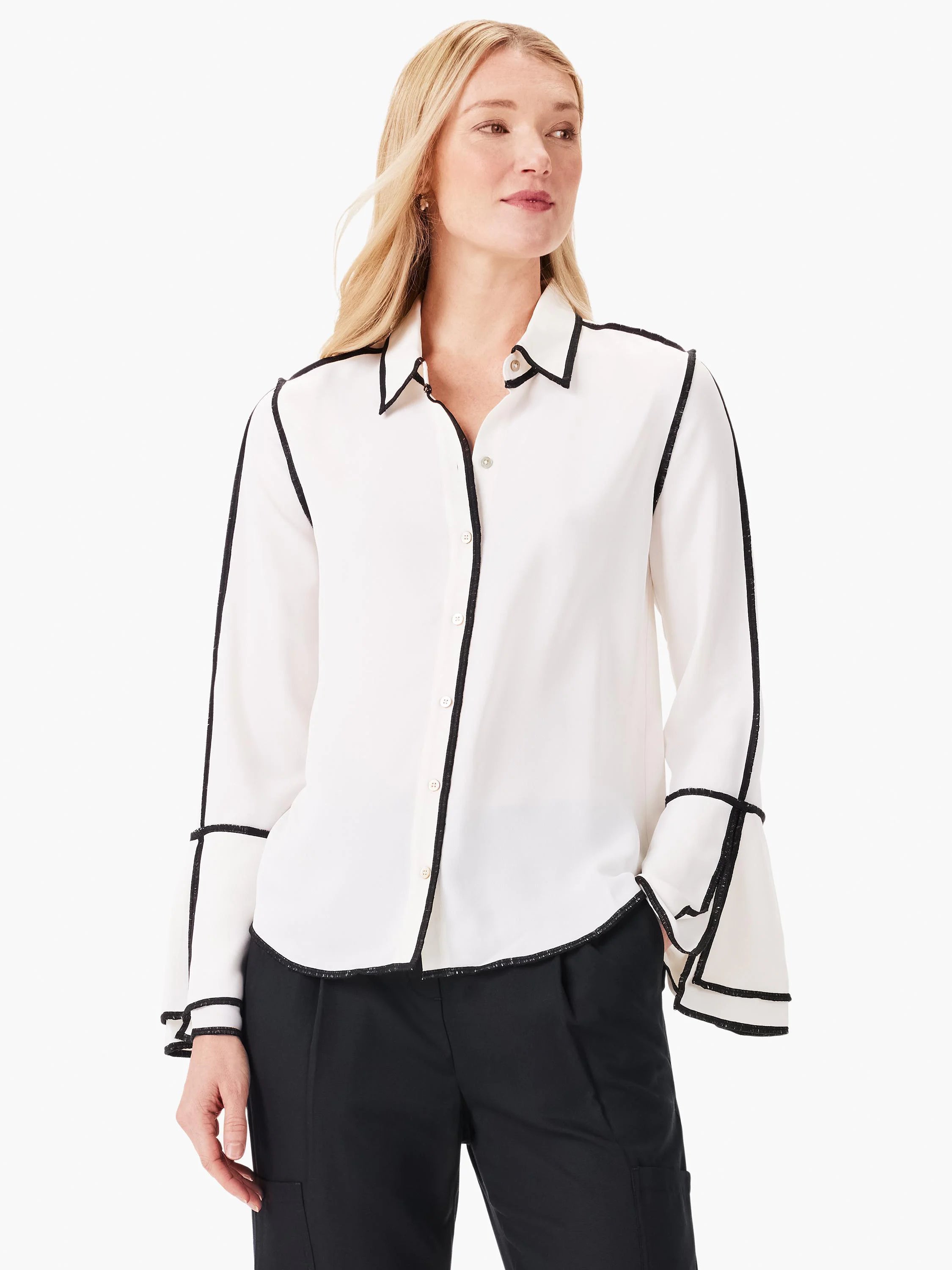 Off-white long-sleeve button-down shirt with black trim along the collar, placket, cuffs, and sleeve seams.  Bell sleeves.