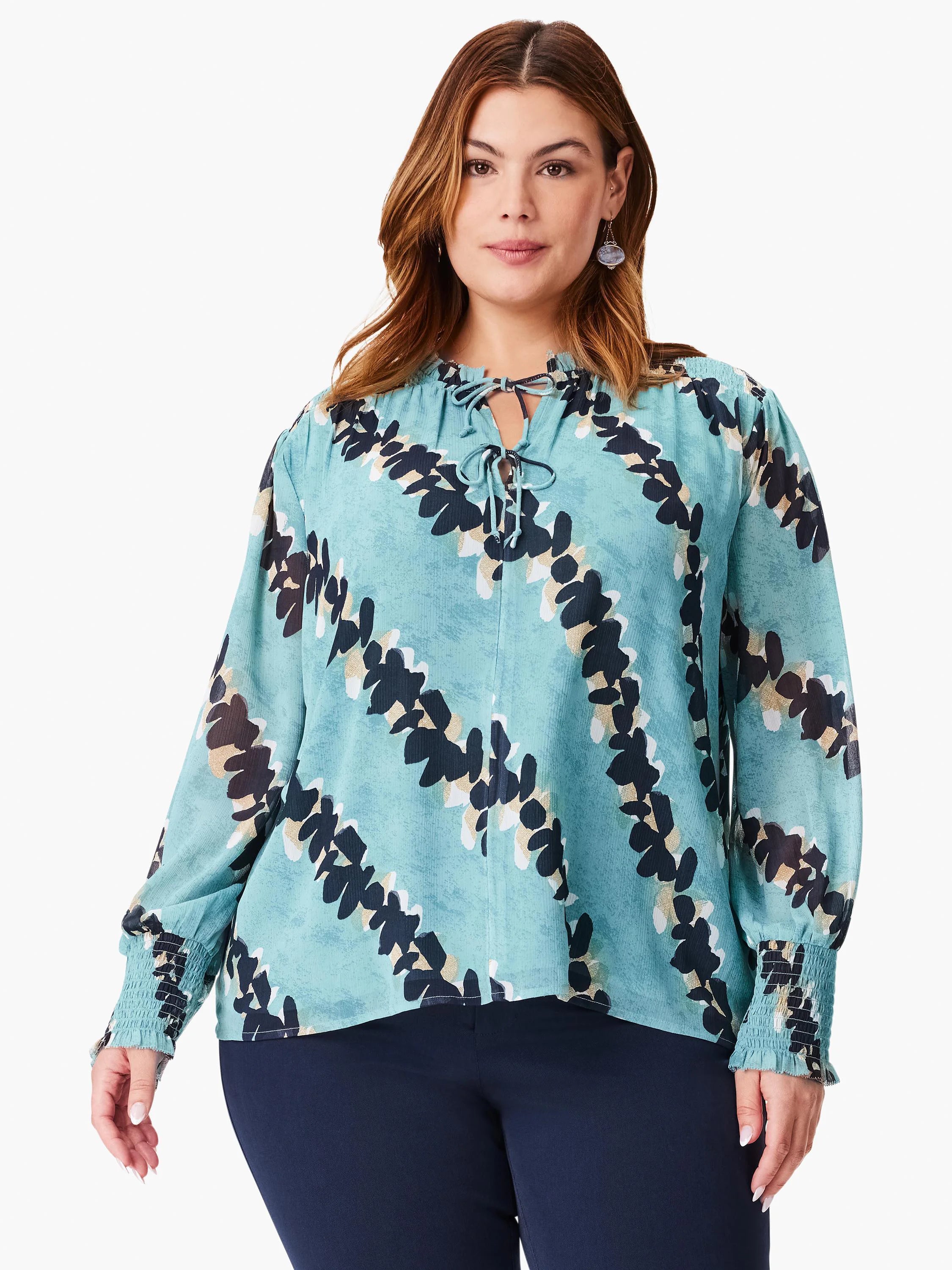 Teal long-sleeve blouse with a dark-blue and beige abstract print, keyhole neckline, and elasticized cuffs.