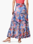 Blue tiered maxi skirt with red, pink, and gray floral print.  Elastic waistband.