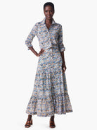 Maxi skirt in blue, tan, & pink ikat print.  Tiered, with a button front.