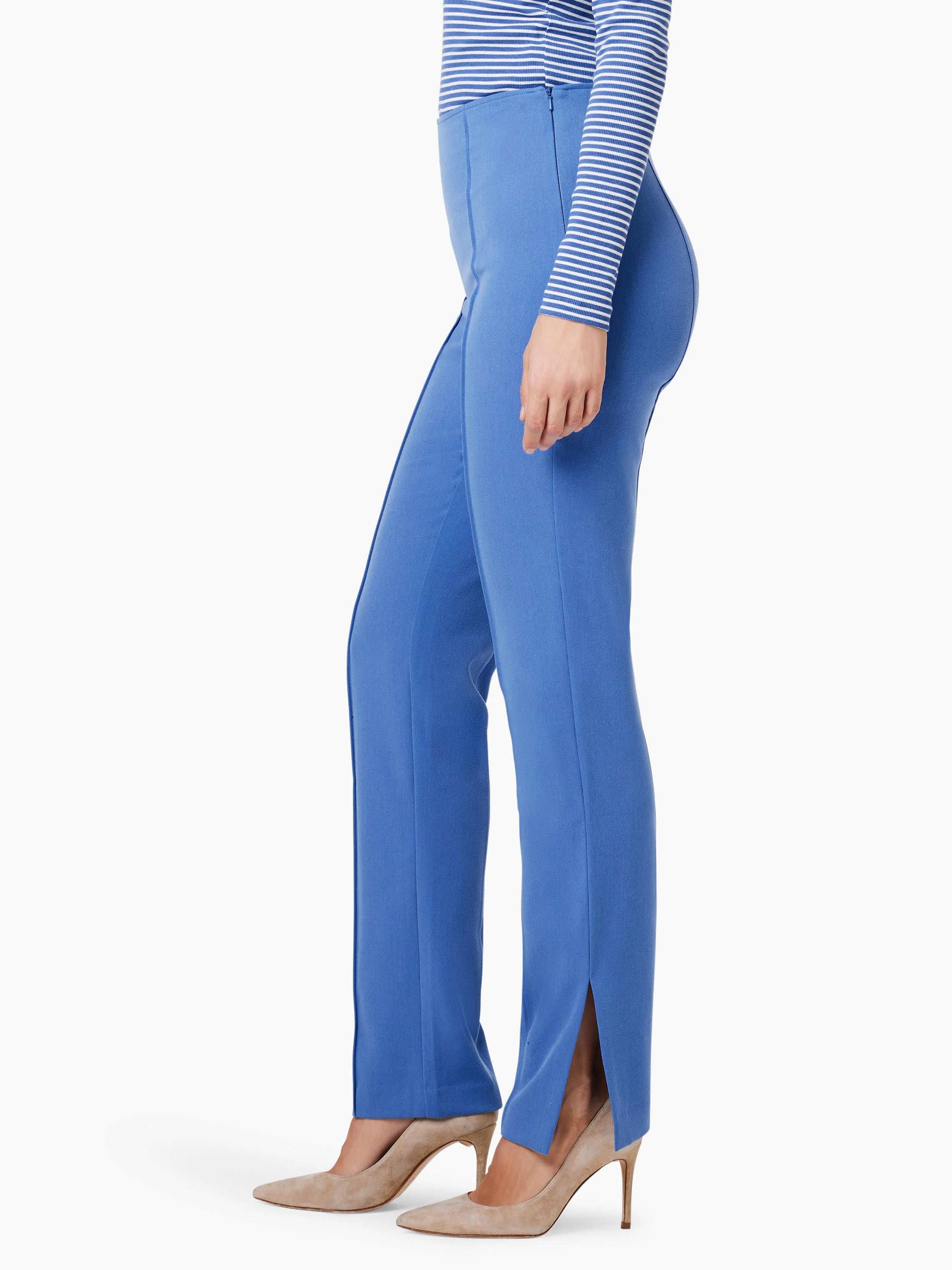 Side view of blue straight-leg pants with side slits.  The pants are a solid color.