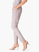 Light taupe cargo pants; relaxed fit, ankle length.  Features include pockets and button detailing.