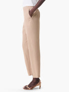 Beige straight-leg pants with thin pale pink and yellow stripes; side pockets.