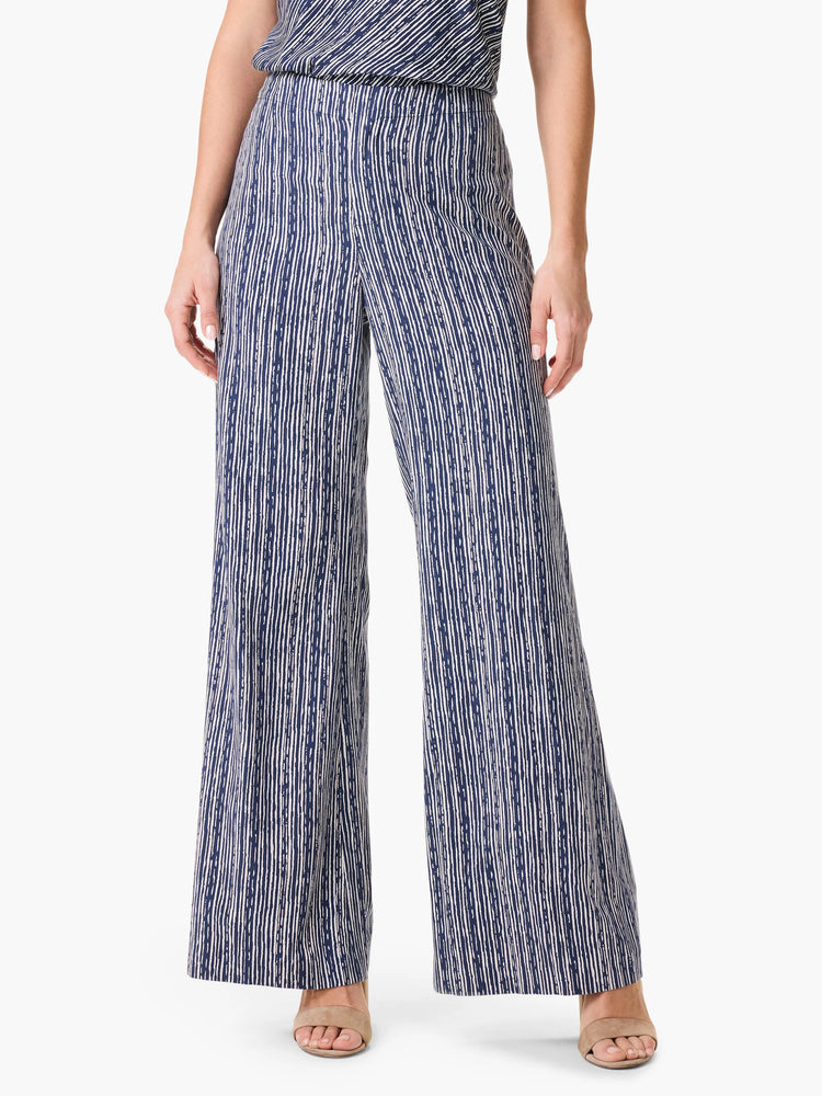 Wide-leg pants in navy blue and off-white vertical stripes.  The stripes have a slightly textured appearance.