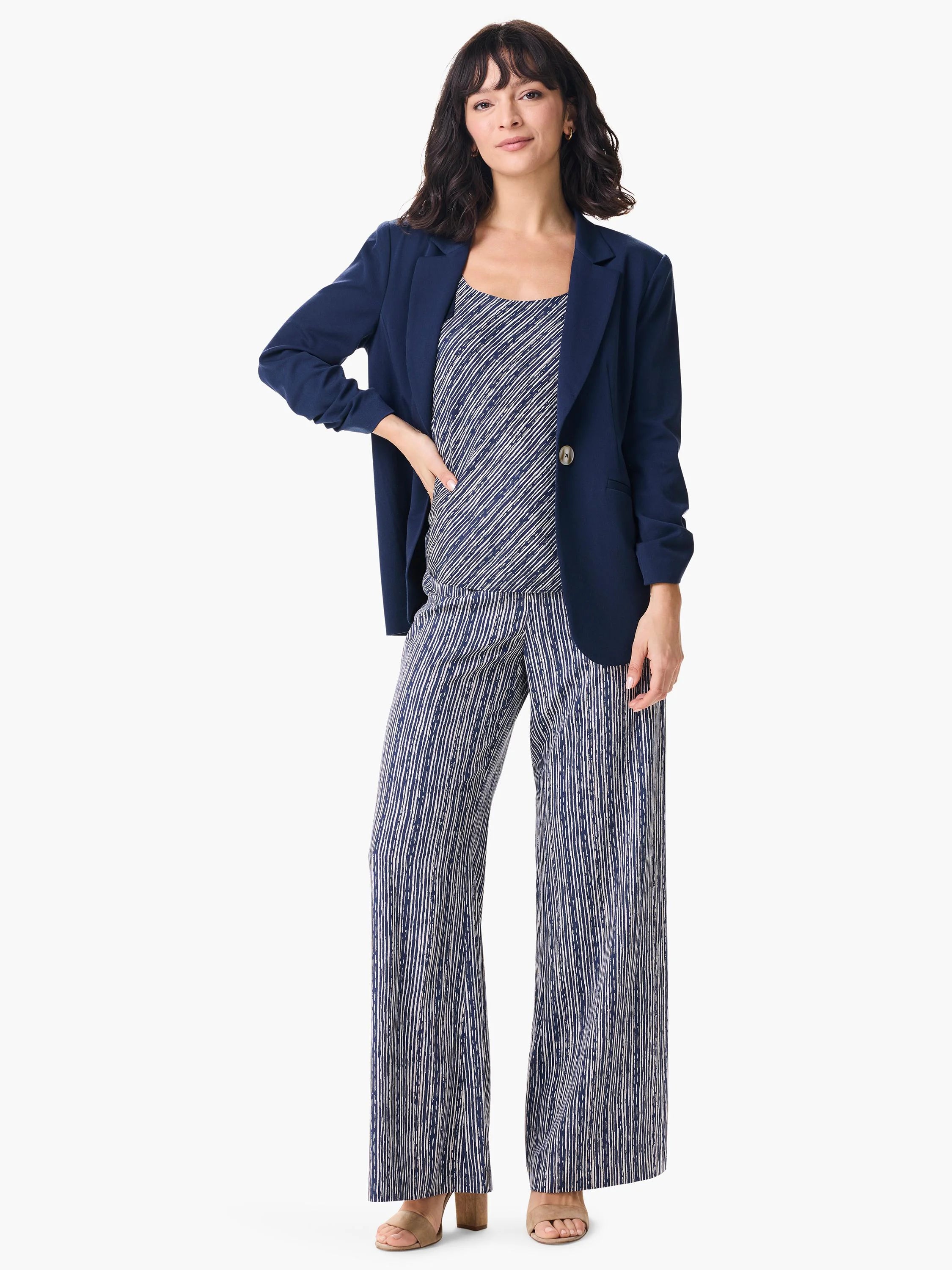Wide-leg pants; navy blue with vertical white/grey stripes.  Model wears navy blazer.