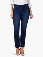 Dark blue mid-rise straight leg jeans with prominent rectangular front patch pockets.