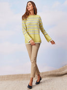 Khaki mid-rise straight pocket jeans on a model.