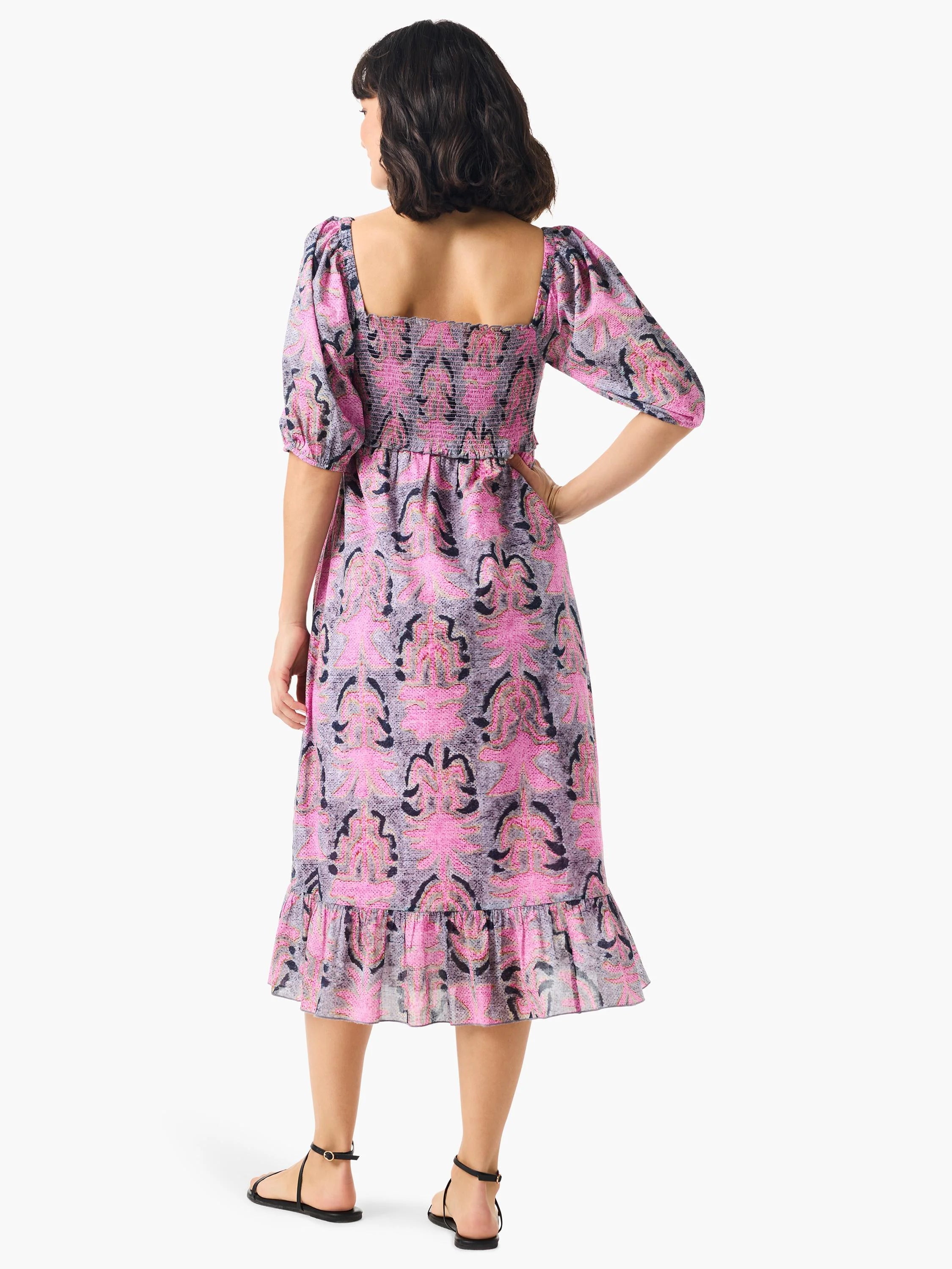 Pink and gray floral midi dress with puff sleeves, square neckline, and smocked bodice.  Features a ruffled hem.