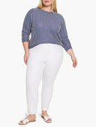 Navy and white zig-zag knit top with 3/4 sleeves and a crew neck.