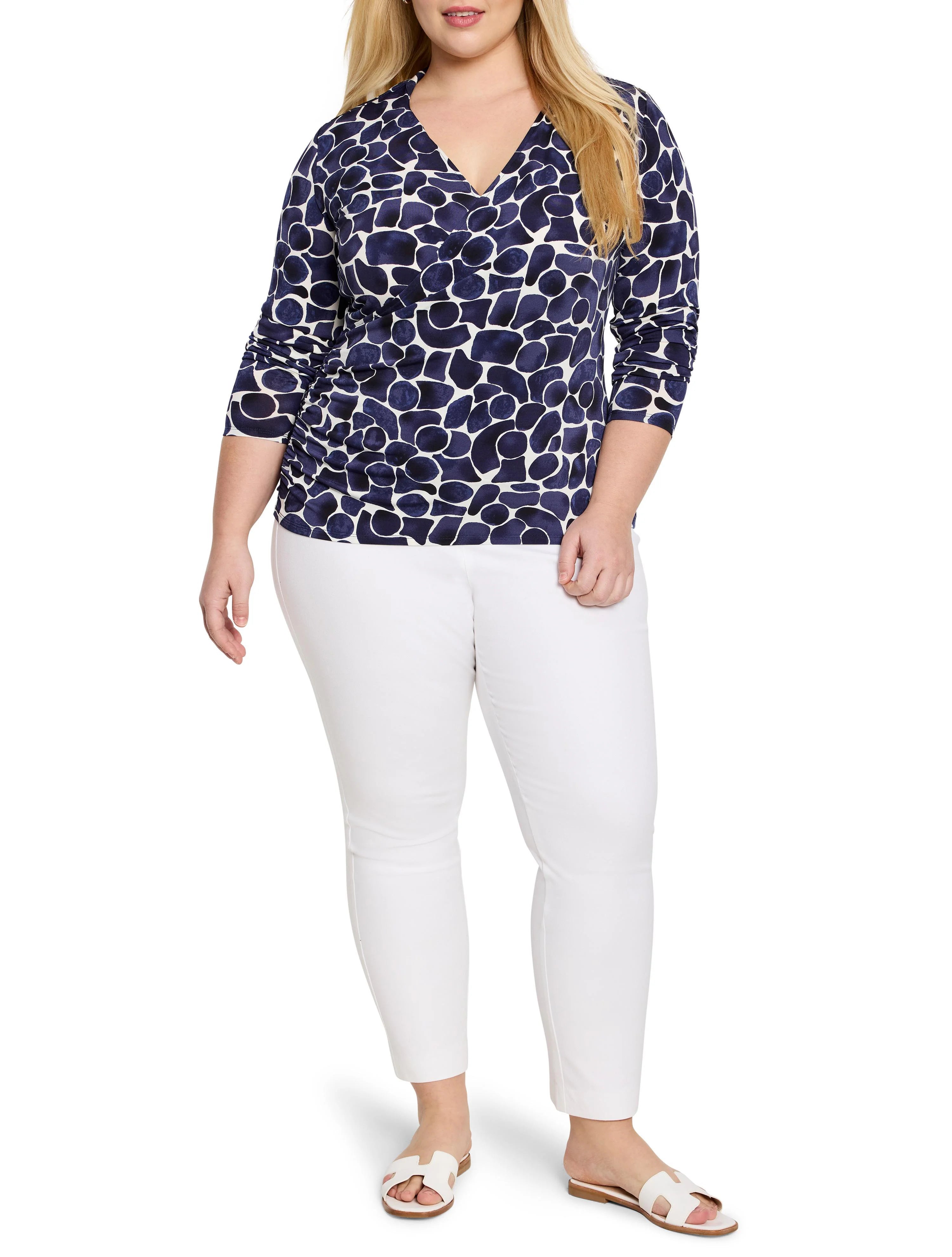 Navy and white geo pebble print wrap top with a V-neck and 3/4 sleeves.