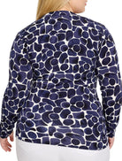Dark blue and white geo pebble print long-sleeve knit top, shown from the back.