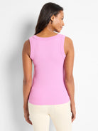Fitted pink ribbed knit scoop neck tank top.