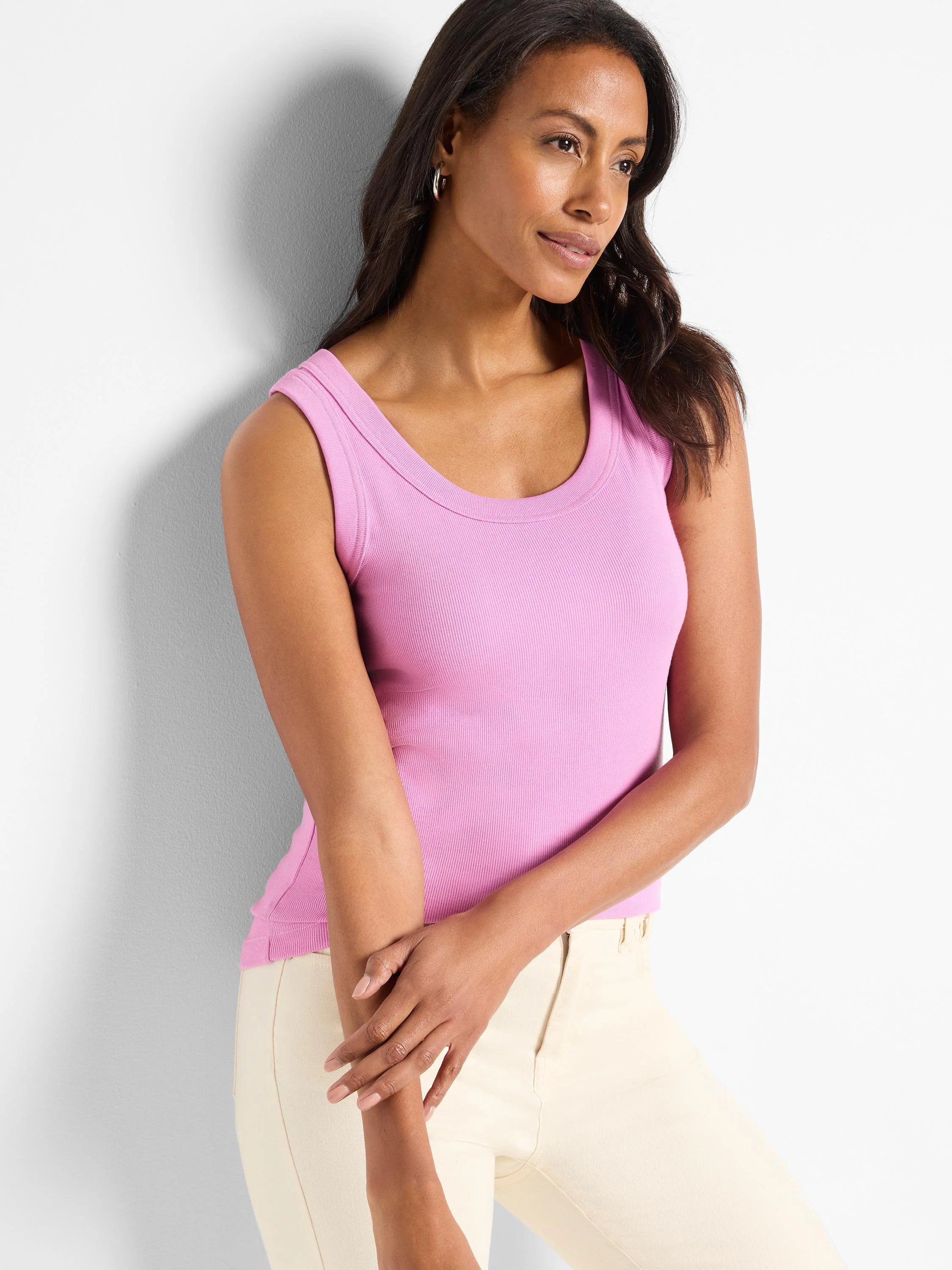 Pink ribbed tank with a scoop neck and wide straps.