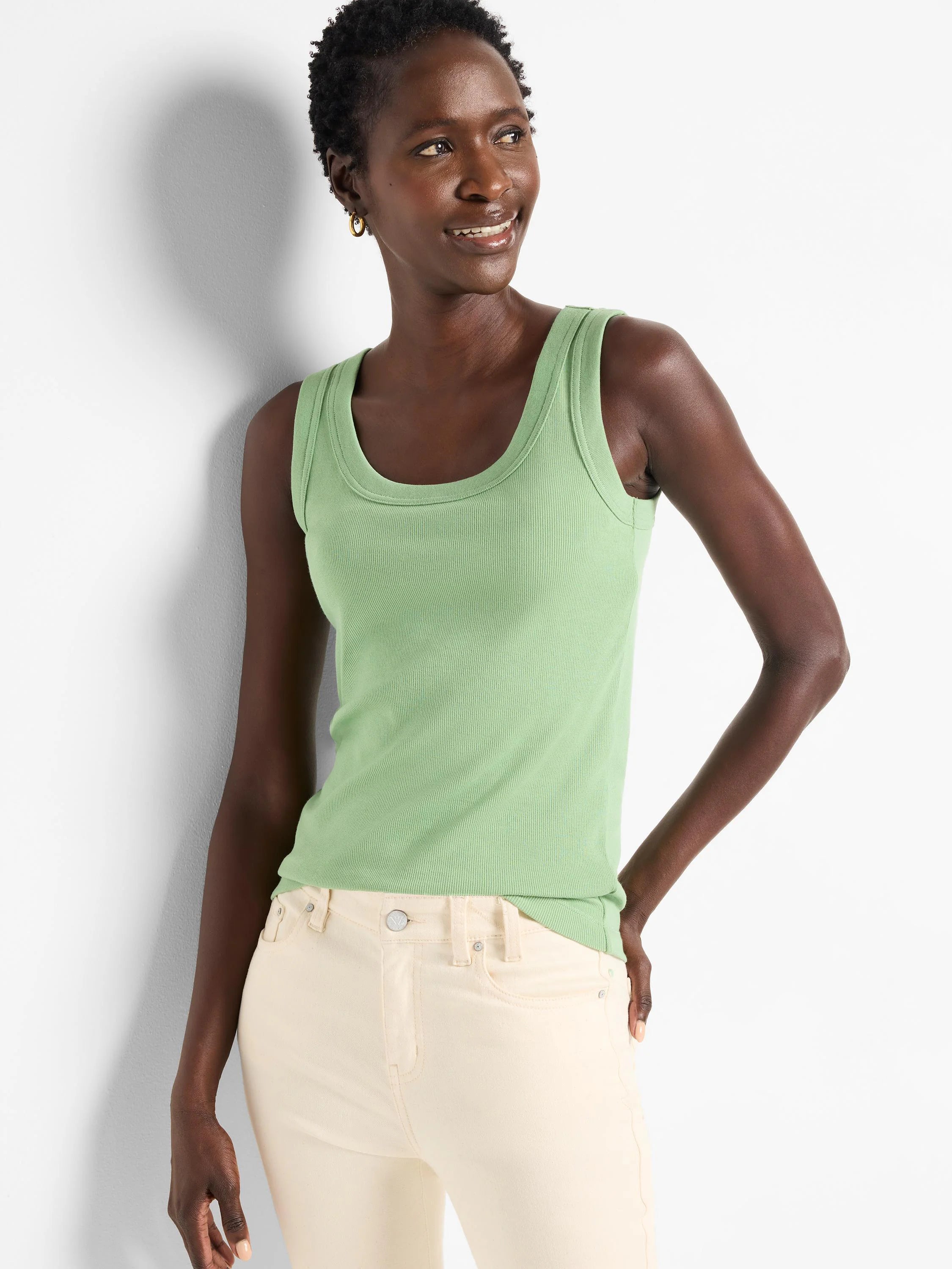 Sage green ribbed knit scoop tank top.