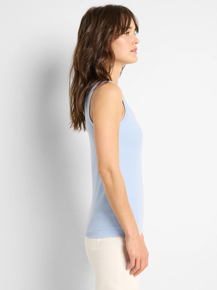 Light blue rib knit scoop tank top worn by a model, shown from the side.