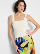 Off-white bubble knit tank top with a square neckline and wide straps.