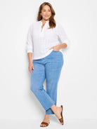 White knit eyelet top with a split neck, small collar, and 3/4 length sleeves.