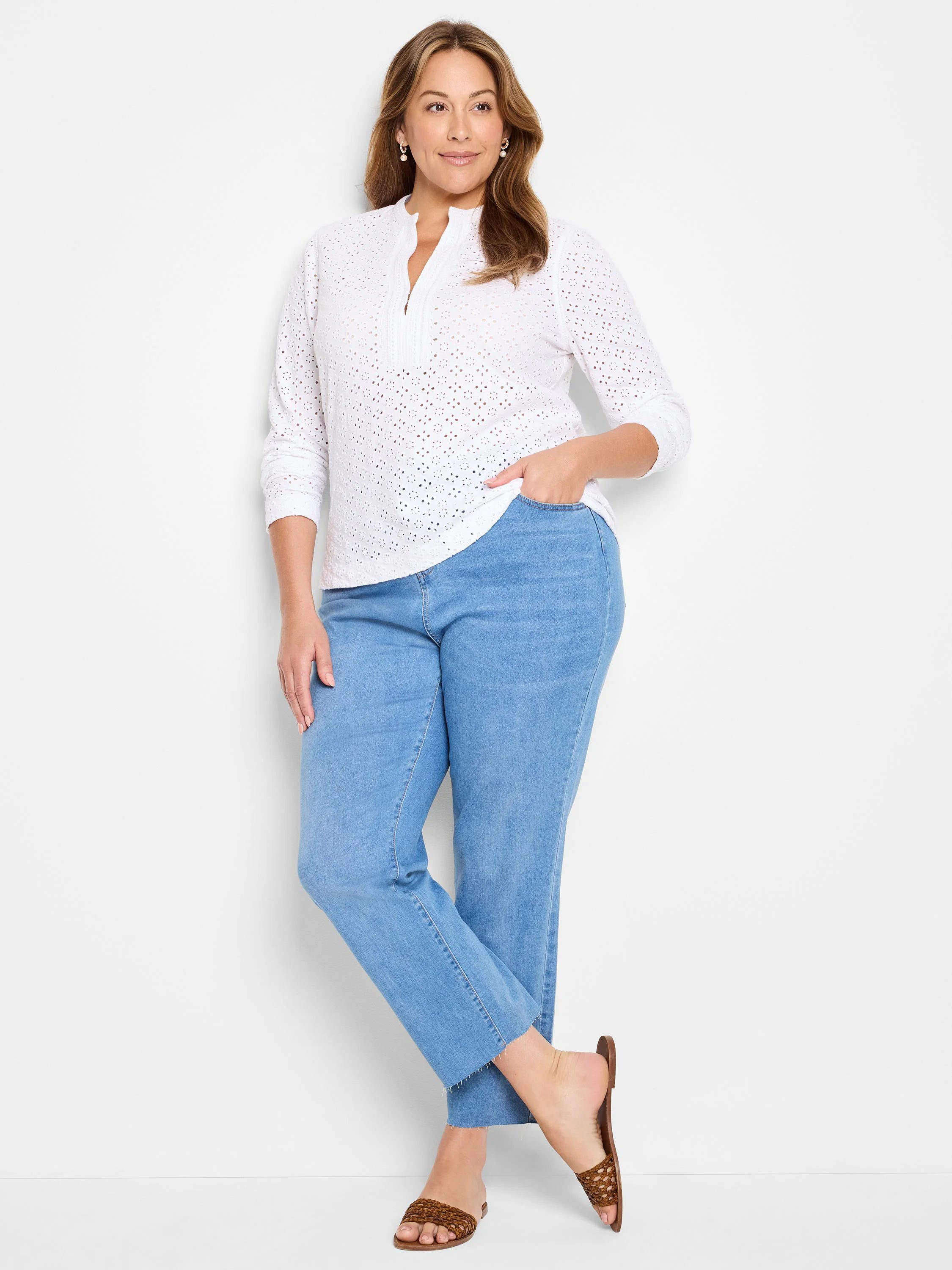 White knit eyelet top with a split neck, small collar, and 3/4 length sleeves.