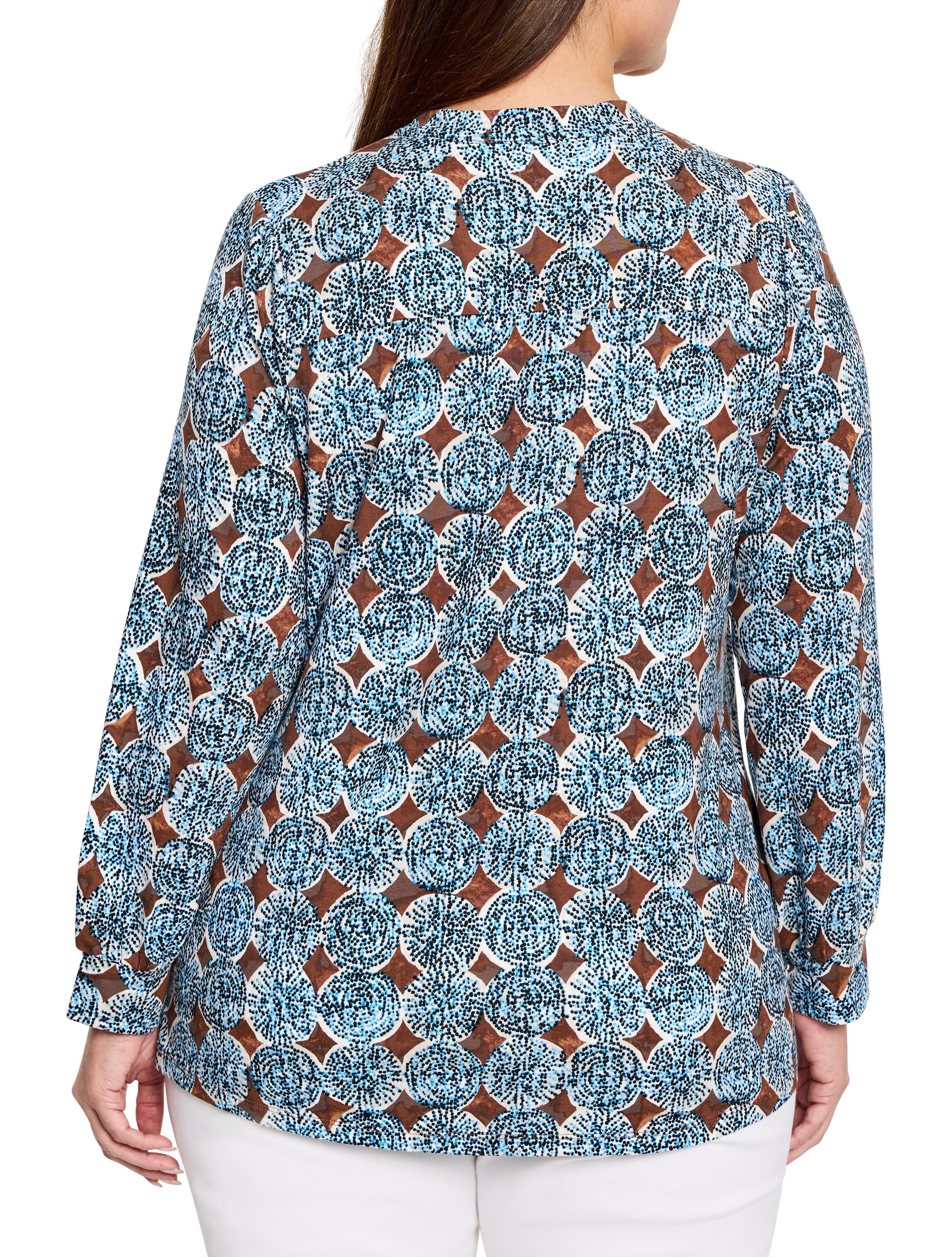 Long-sleeved knit top with brown diamond shapes and blue/white dotted circles resembling sand dollars.