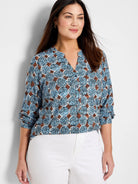 Sand Dollar Knit Top: Blue, brown & cream dotted geometric pattern, V-neck, rolled 3/4 sleeves.