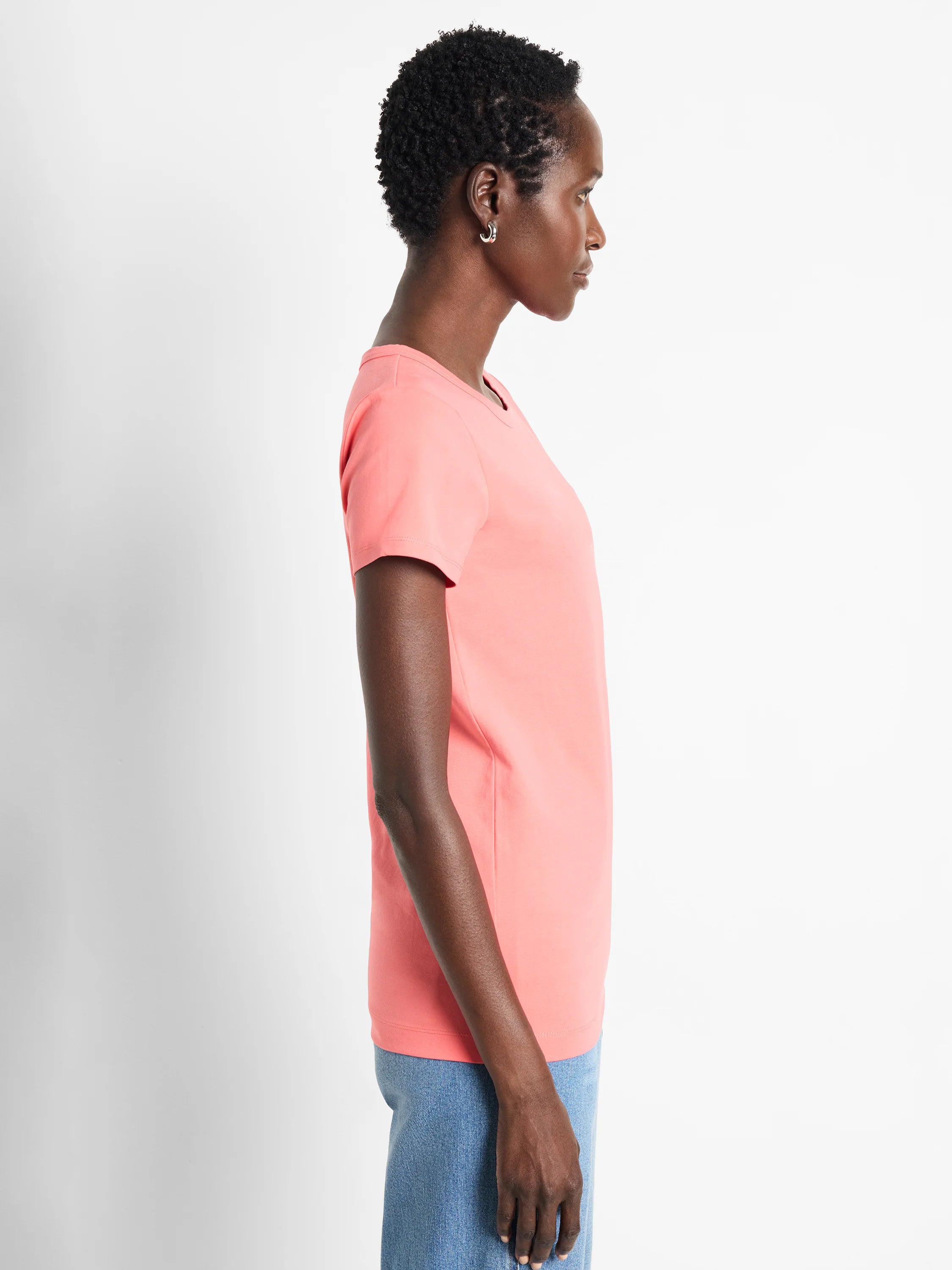 Coral pink, short-sleeved t-shirt with a relaxed fit.