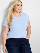 Light blue, smooth knit crew neck t-shirt with short sleeves.