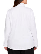Back of a white long-sleeved shirt featuring a ruffled stand collar and buttoned cuffs.