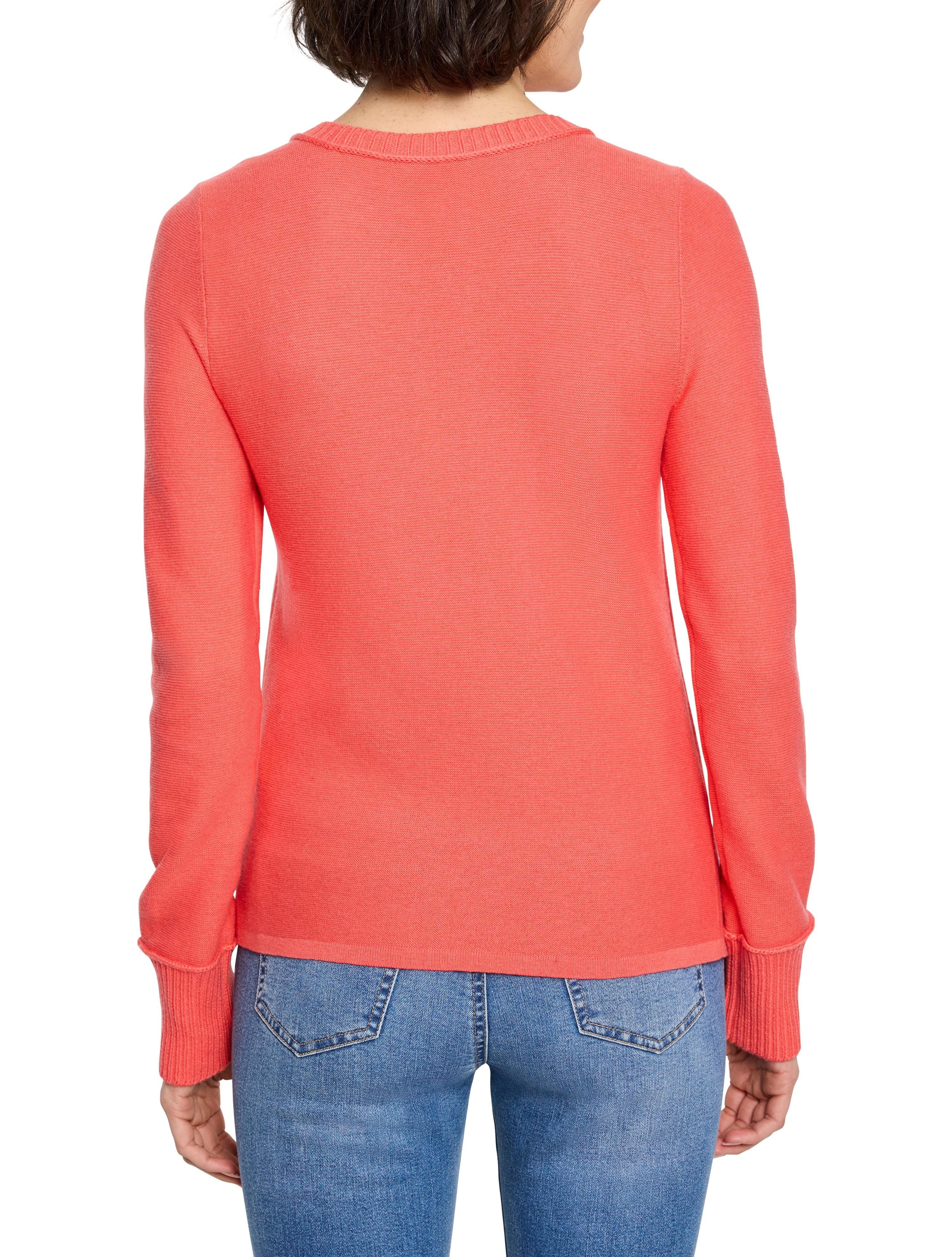 Coral garter knit crew neck sweater, back view, with ribbed neckline and cuffs.