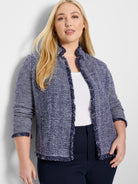 Navy blue and white herringbone knit jacket with fringe trim.  Three-quarter sleeves. Notch collar.